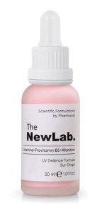 The Newlab 50 Faktör Tüm Ciltler İçin Leke Karşıtı Nemlendirici Yağsız Suya Dayanıklı Yüz ve Vücut Güneş Kremi 50 ml