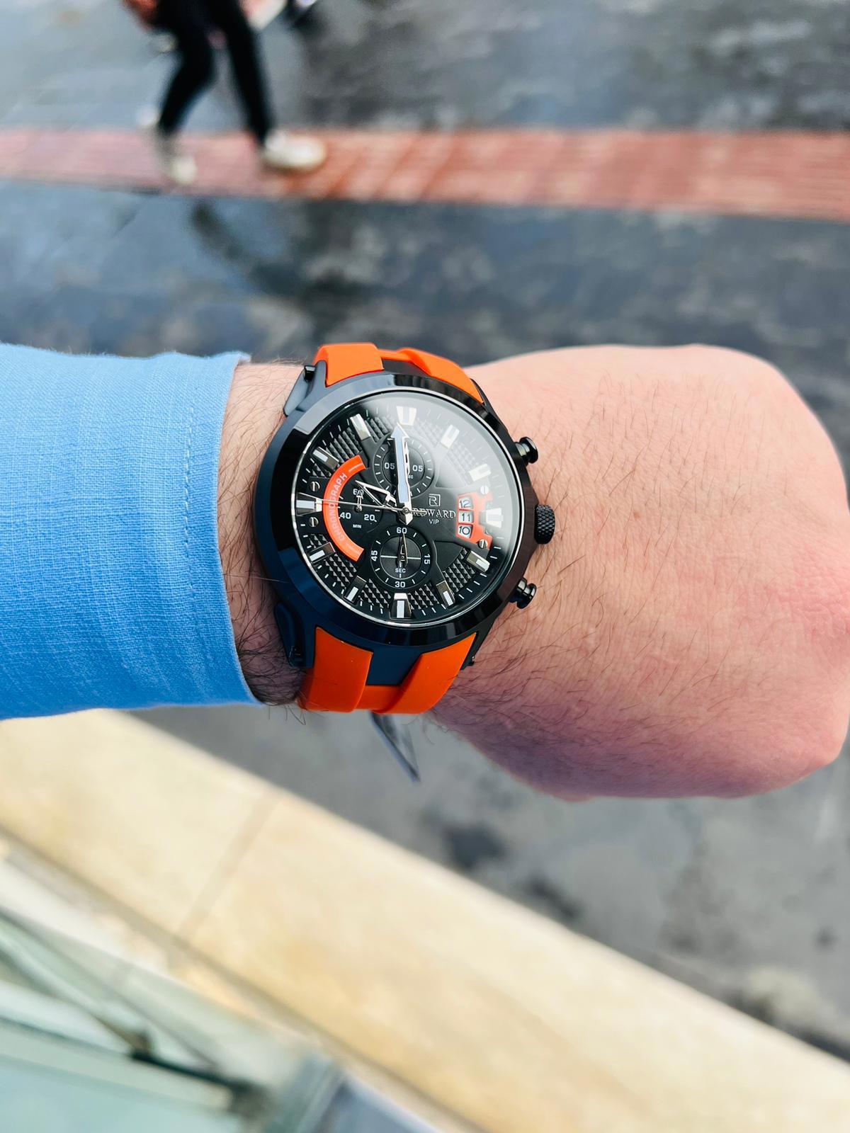 Reward REH597-6 Su Geçirmez Takvimli 44 mm Turuncu Silikon Kordon Analog Erkek Kol Saati