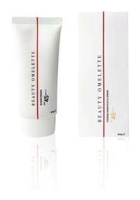 Beauty Omelette 50 Faktör Tüm Ciltler İçin Leke Karşıtı Nemlendirici Yağsız Suya Dayanıklı Yüz ve Vücut Güneş Kremi 50 ml