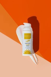 Sofia Beauty 50 Faktör Tüm Ciltler İçin Leke Karşıtı Nemlendirici Yağsız Suya Dayanıklı Yüz ve Vücut Güneş Kremi 50 ml