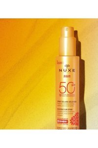 Nuxe 50 Faktör Tüm Ciltler İçin Leke Karşıtı Nemlendirici Yağsız Suya Dayanıklı Yüz ve Vücut Güneş Kremi 150 ml