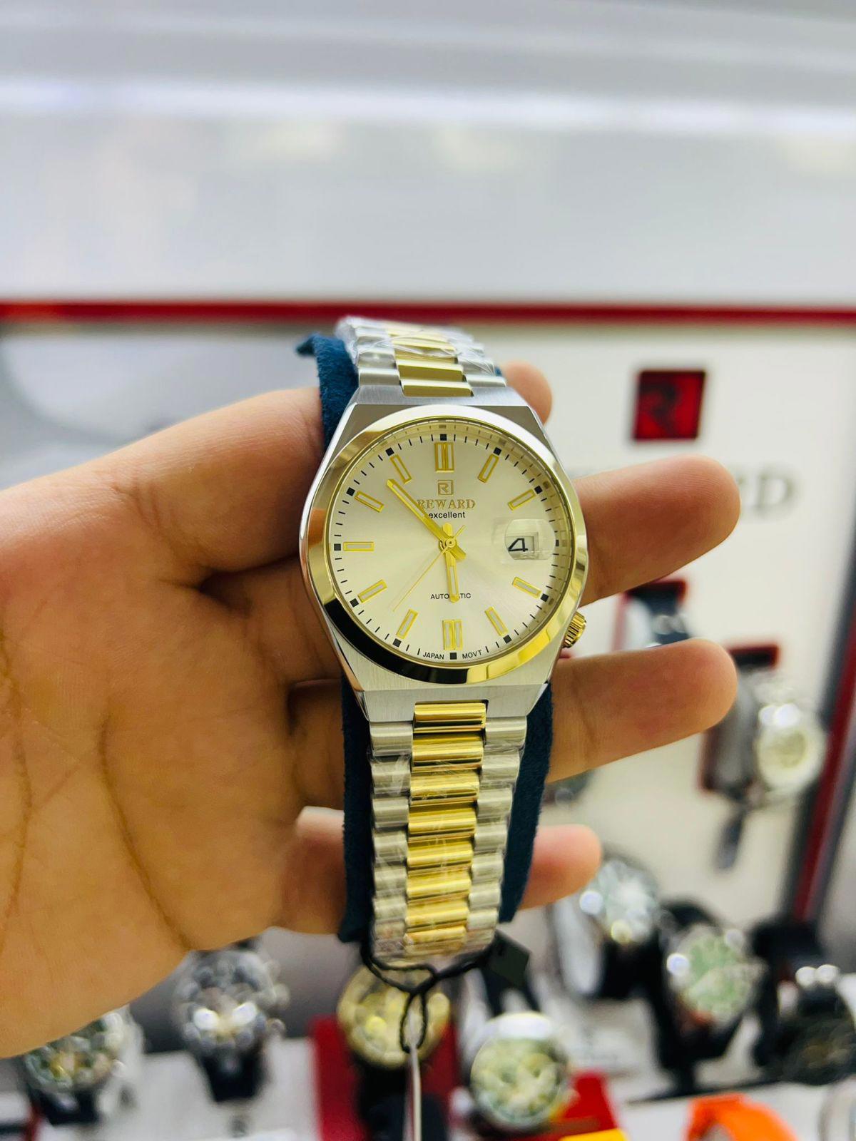 Reward NJ4568.88X.5 Su Geçirmez Takvimli 42 mm Gri-Sarı Çelik Kordon Analog Erkek Kol Saati
