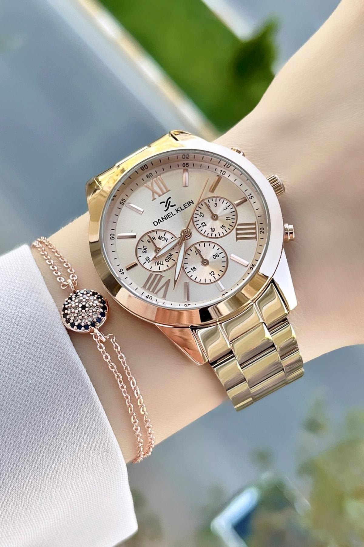 Daniel Klein DKISTE29 38 mm Altın Çelik Kordon Analog Kadın Kol Saati