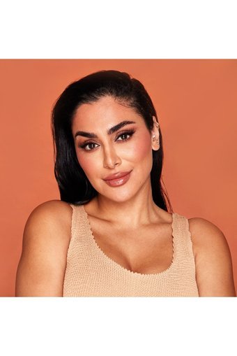 Huda Beauty GloWish Sassy Saffron 06 Işıltılı Toz Allık