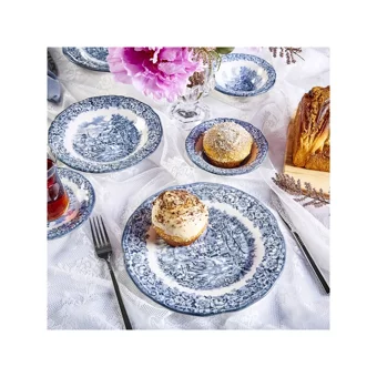 Karaca Mora Yuvarlak Desenli 18 Parça 4 Kişilik Stoneware Seramik
Kahvaltı Takımı Beyaz-Mavi