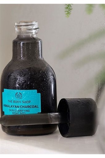 The Body Shop Himalayan Charcoal Siyah Nokta Karşıtı Serum Şişe Yüz Peelingi